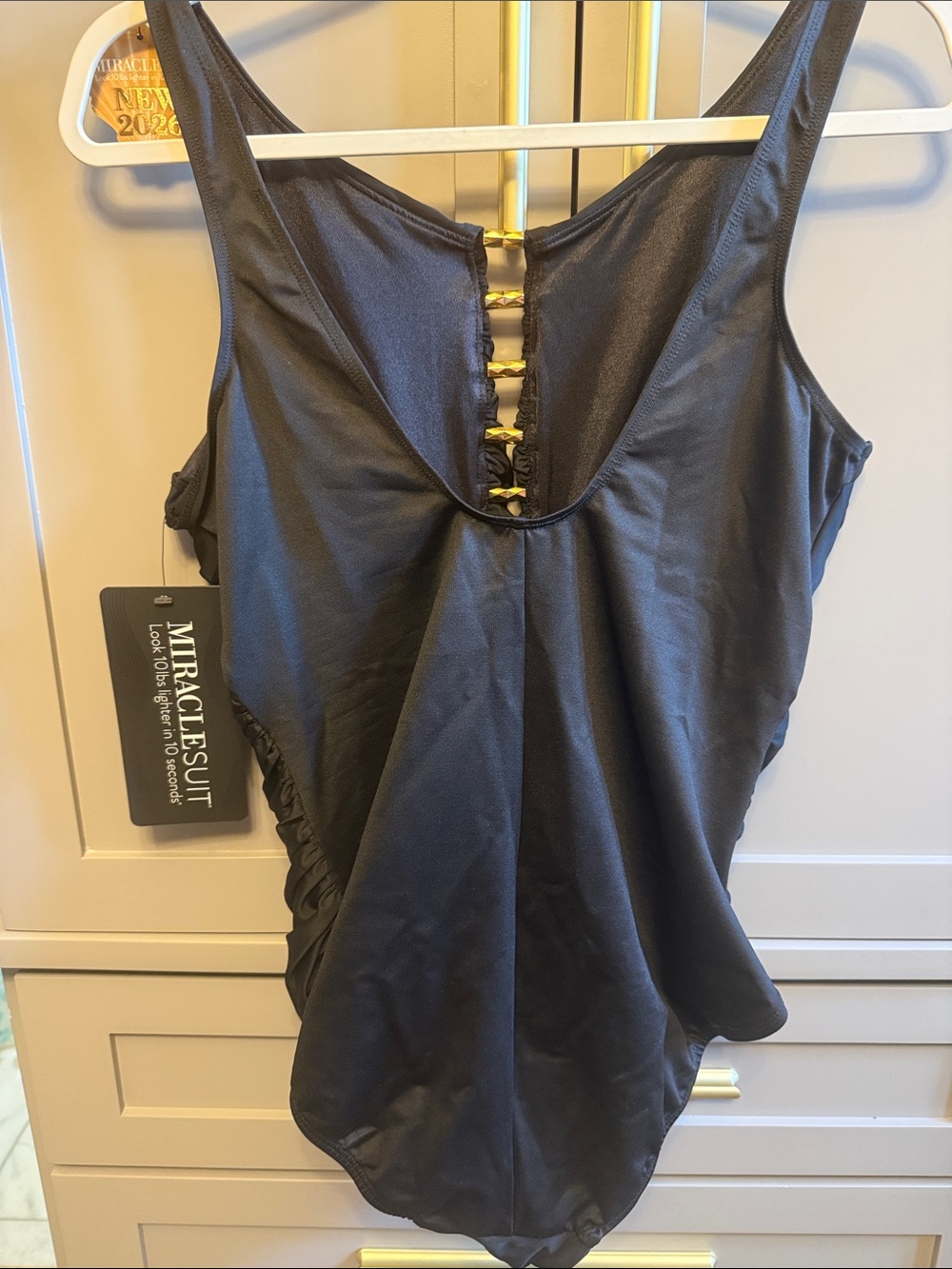 Miraclesuit Slimming Black One-Piece Swimsuit with Gold Accents, Swizzle - Picture 3 of 5